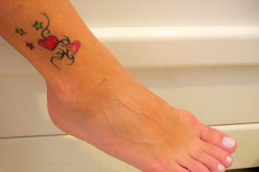 heart tattos on foot. Heart Shaped Tattoo on Foot. Foot tattoo deals with getting beautiful 