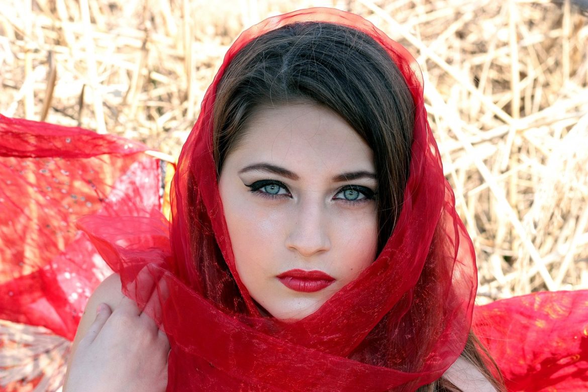 girl wearing red colored lipstick